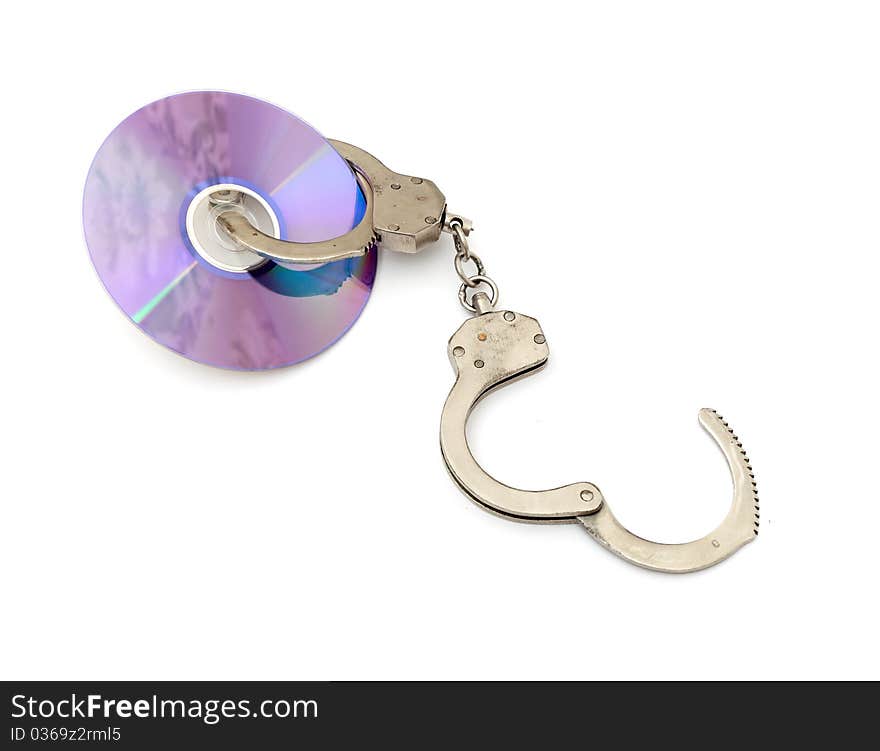 Cd with handcuffs isolated on white background