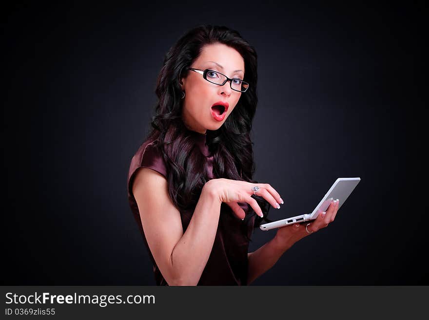 Business woman with a computer in hands