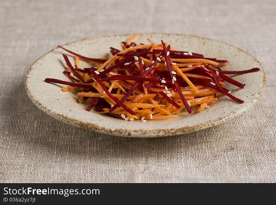 Grated beetroot and carrot with sesame. Grated beetroot and carrot with sesame