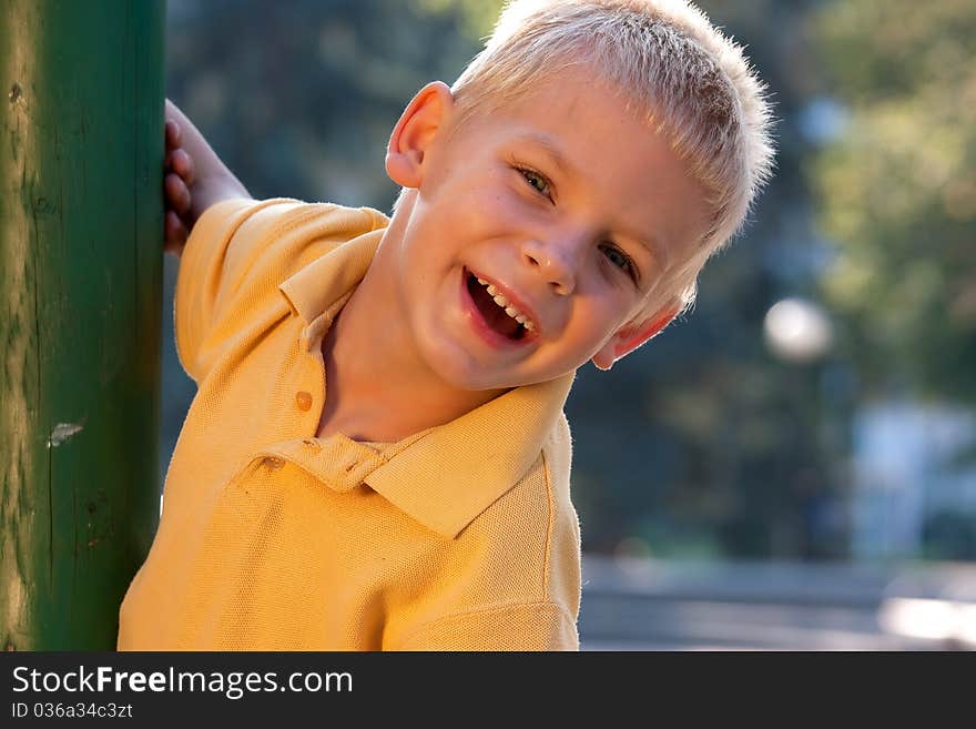 Portrait of smiling little boy - looking at camera