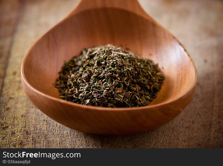 Herbs on wooden spoon,series