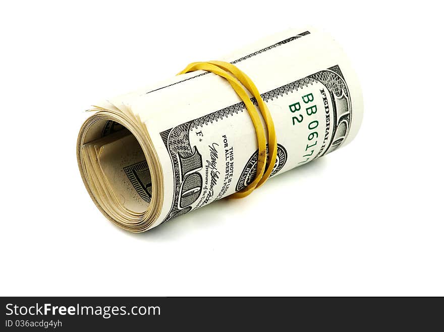 Rolled dollars isolated over white