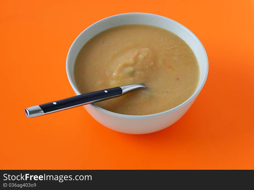 Vegetable soup with spoon