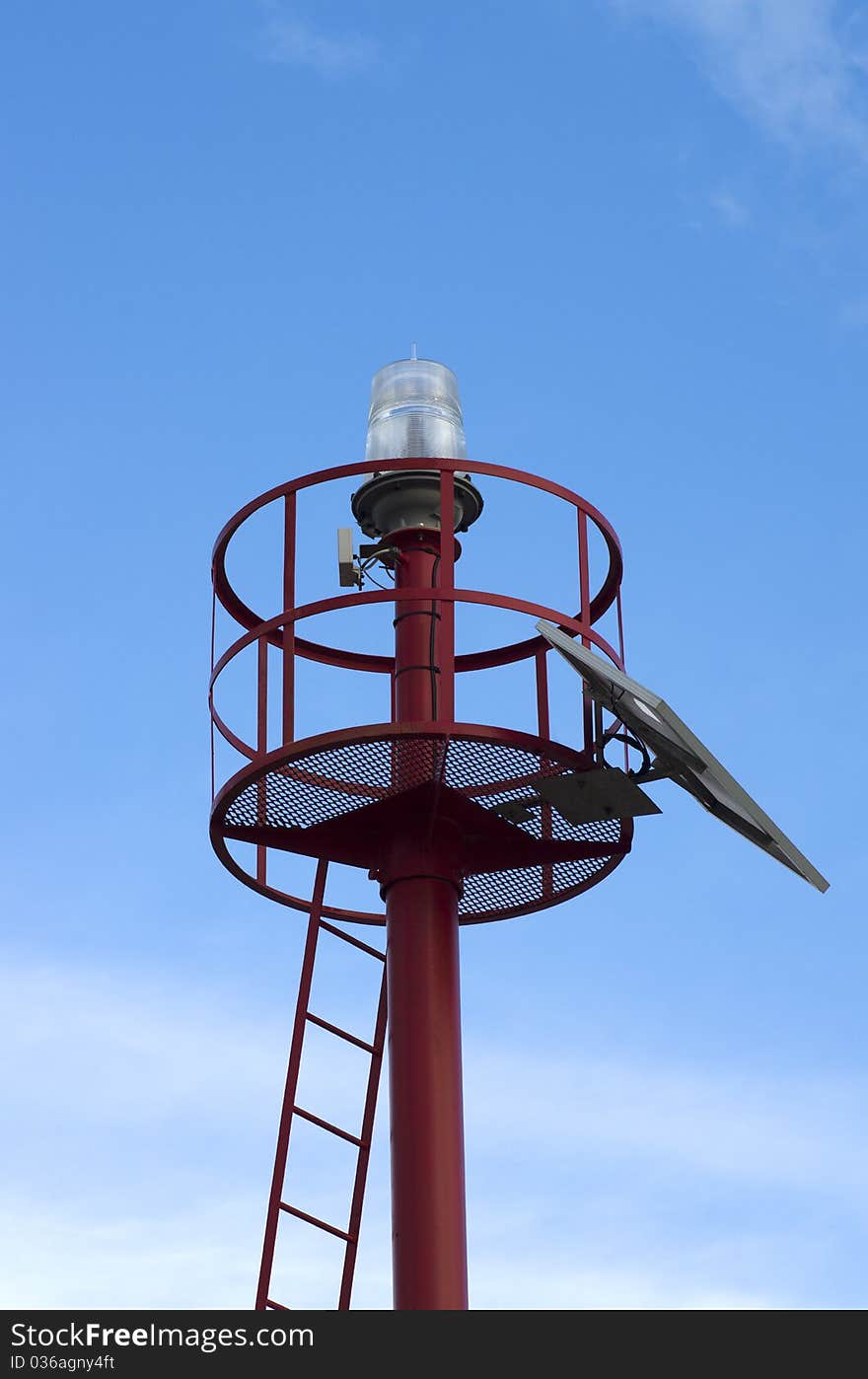 Light house at the entrance of a harbour. Light house at the entrance of a harbour