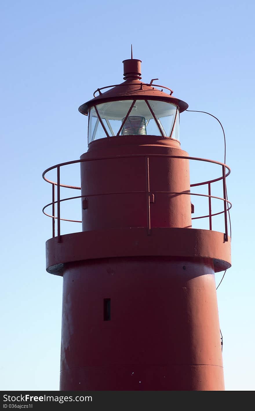 Light house at the entrance of a harbour. Light house at the entrance of a harbour