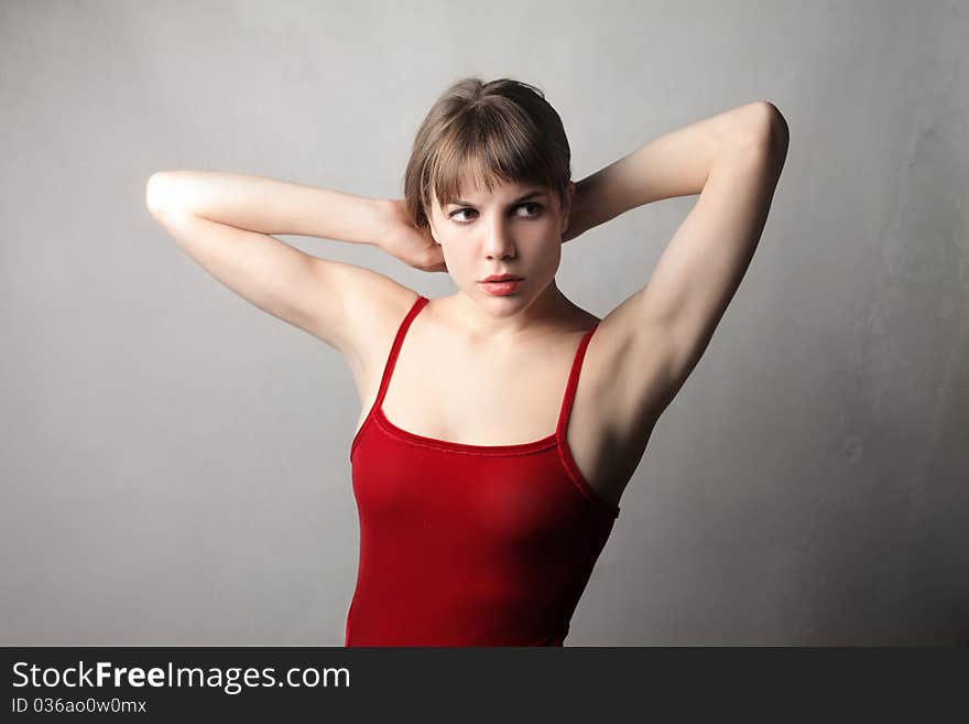 Young beautiful woman holding her hair