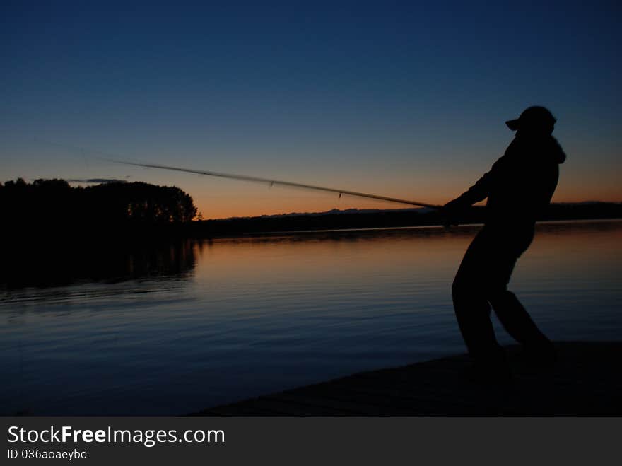 Man fishing on the lake