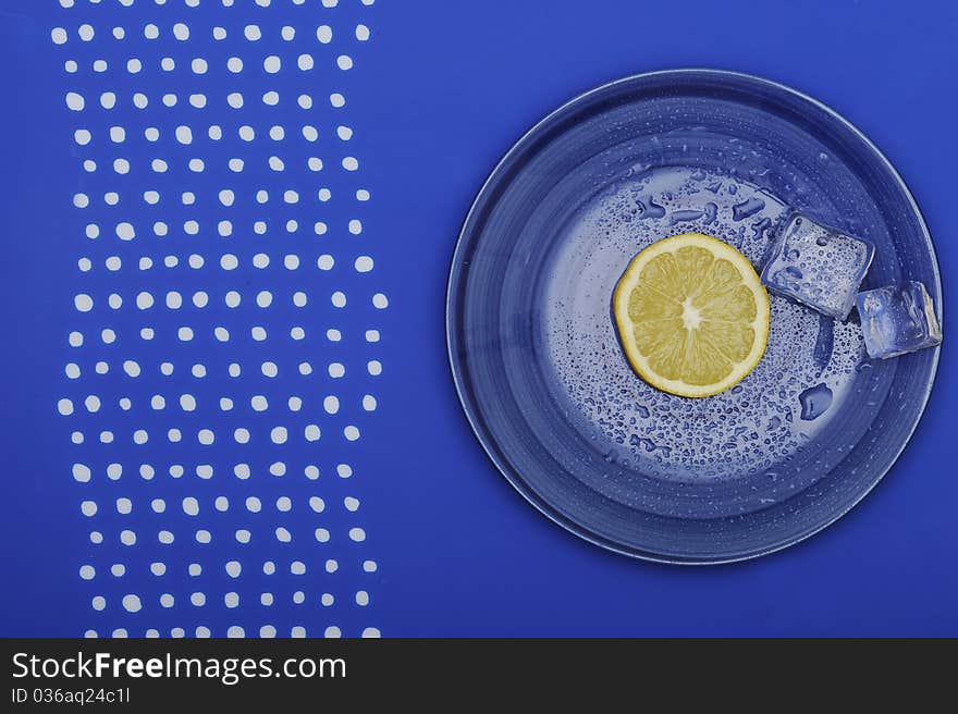 Fresh Lemon On The Blue Plate