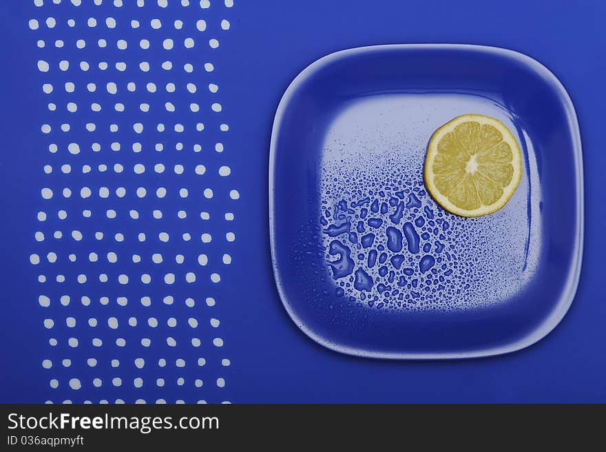 Fresh Lemon On The Blue Plate