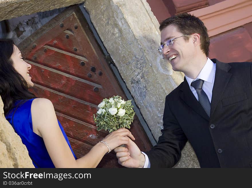 Romantic couple - woman with bouquet