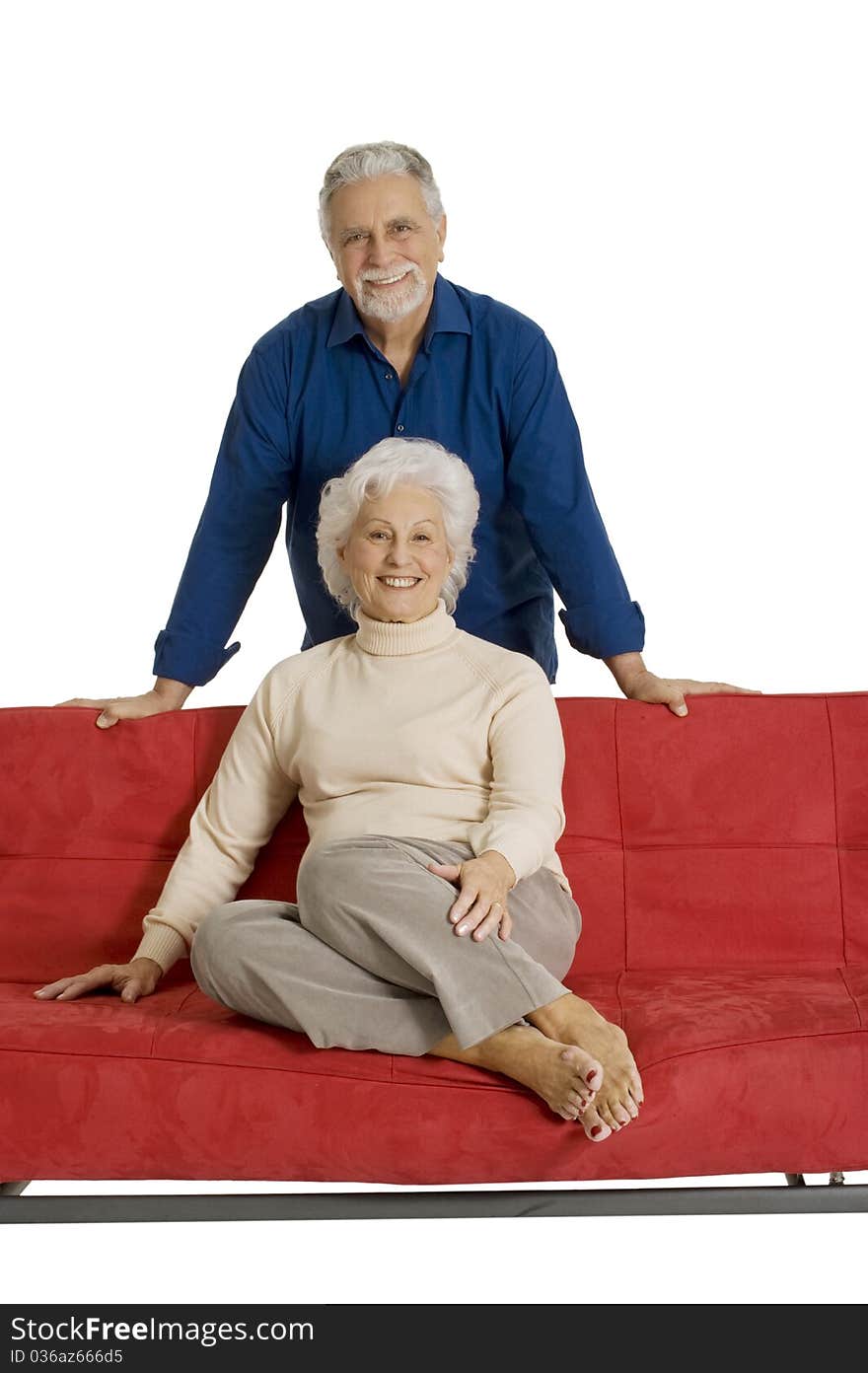 Portrait of a happy couple of elderly in a white background