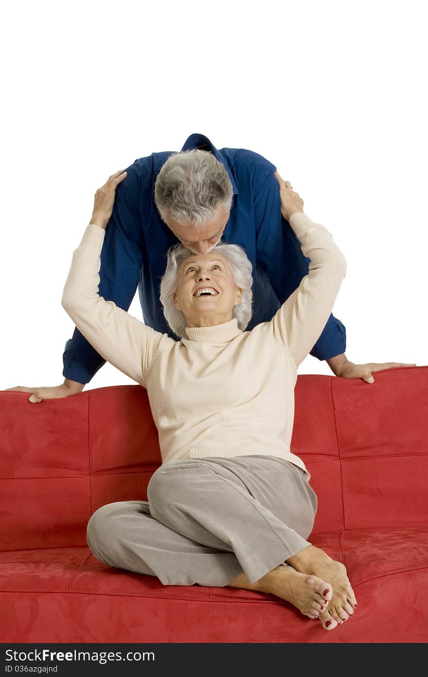 Portrait of a happy couple of elderly in a white background