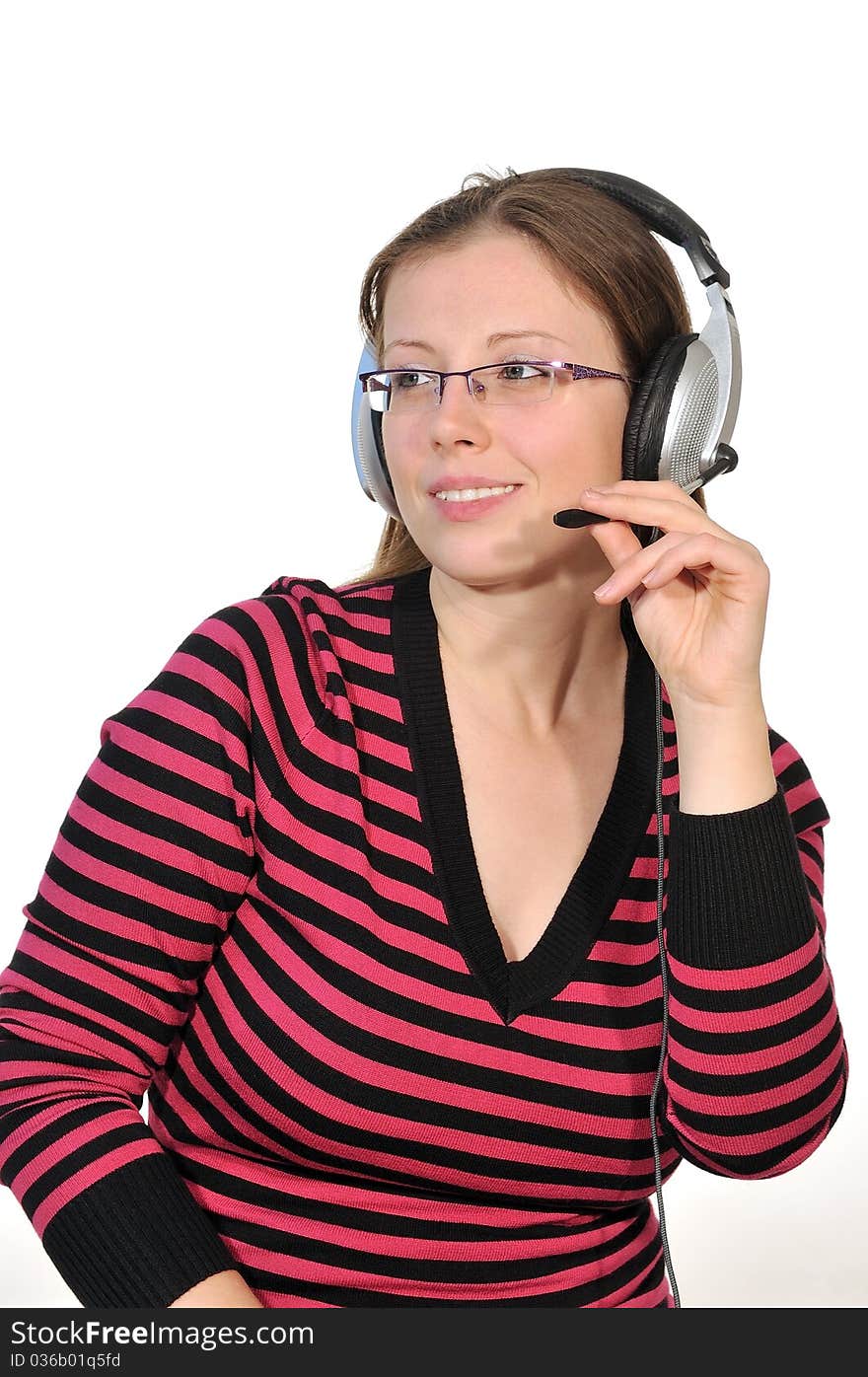 Girl with headphones listening to music and singing karaoke