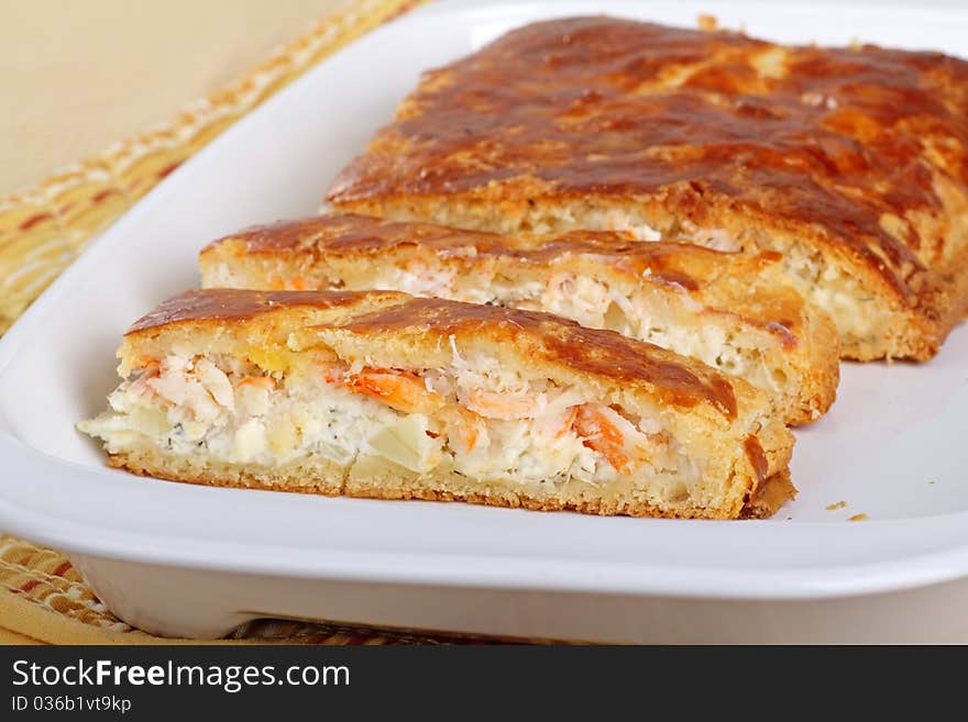 Stuffed crab meat loaf sliced on a platter