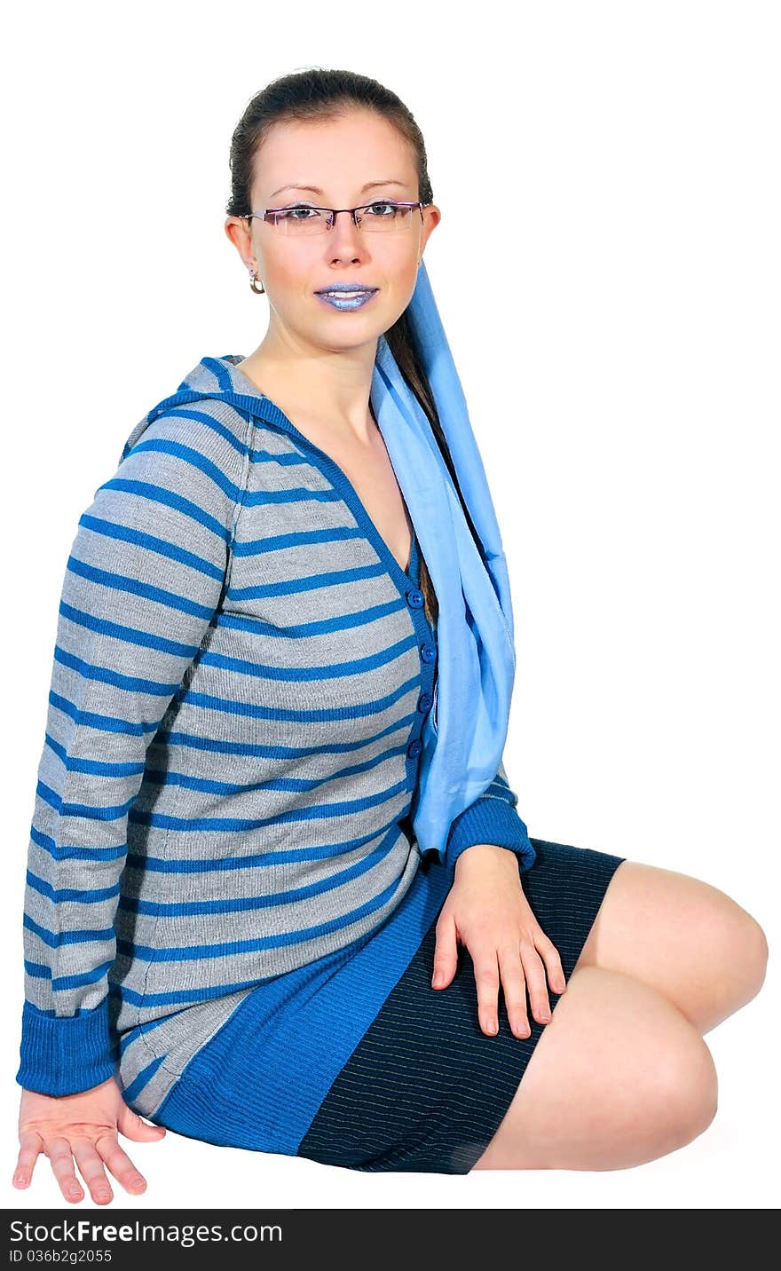 Portrait of a girl in a striped blouse with a scarf in blue tones. Portrait of a girl in a striped blouse with a scarf in blue tones