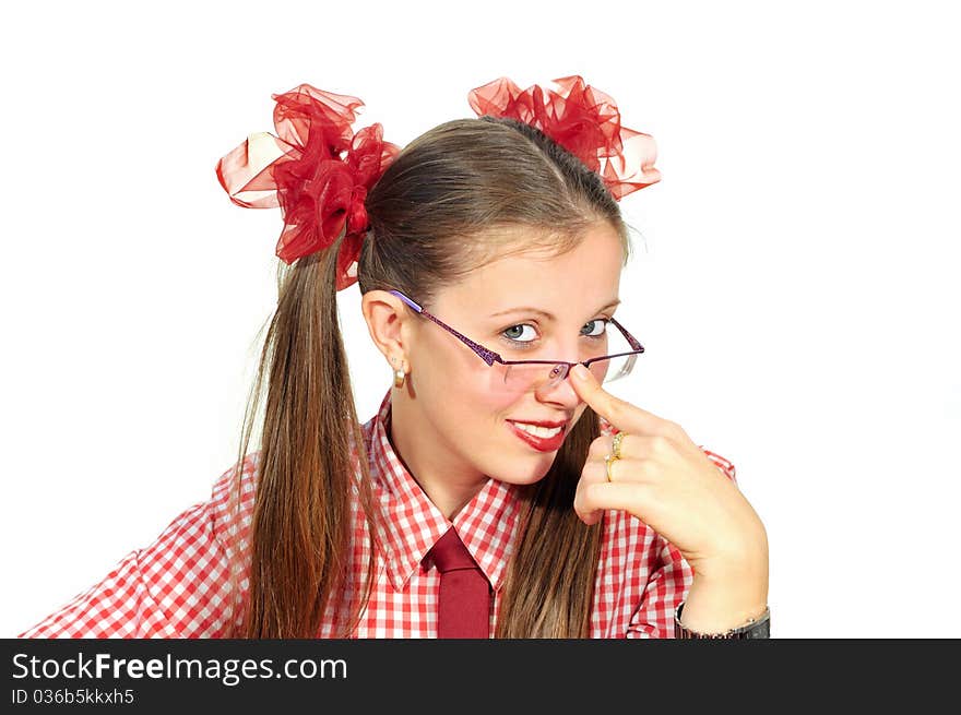 The girl with red ribbons smiling adjusting his glasses. The girl with red ribbons smiling adjusting his glasses