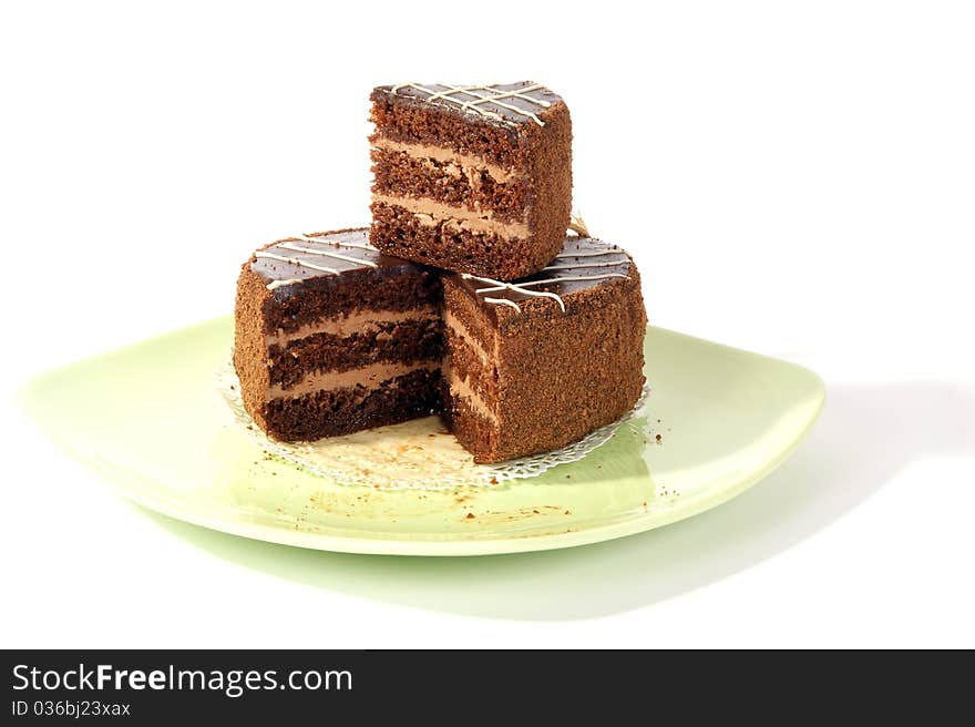 Large piece of cake on a saucer