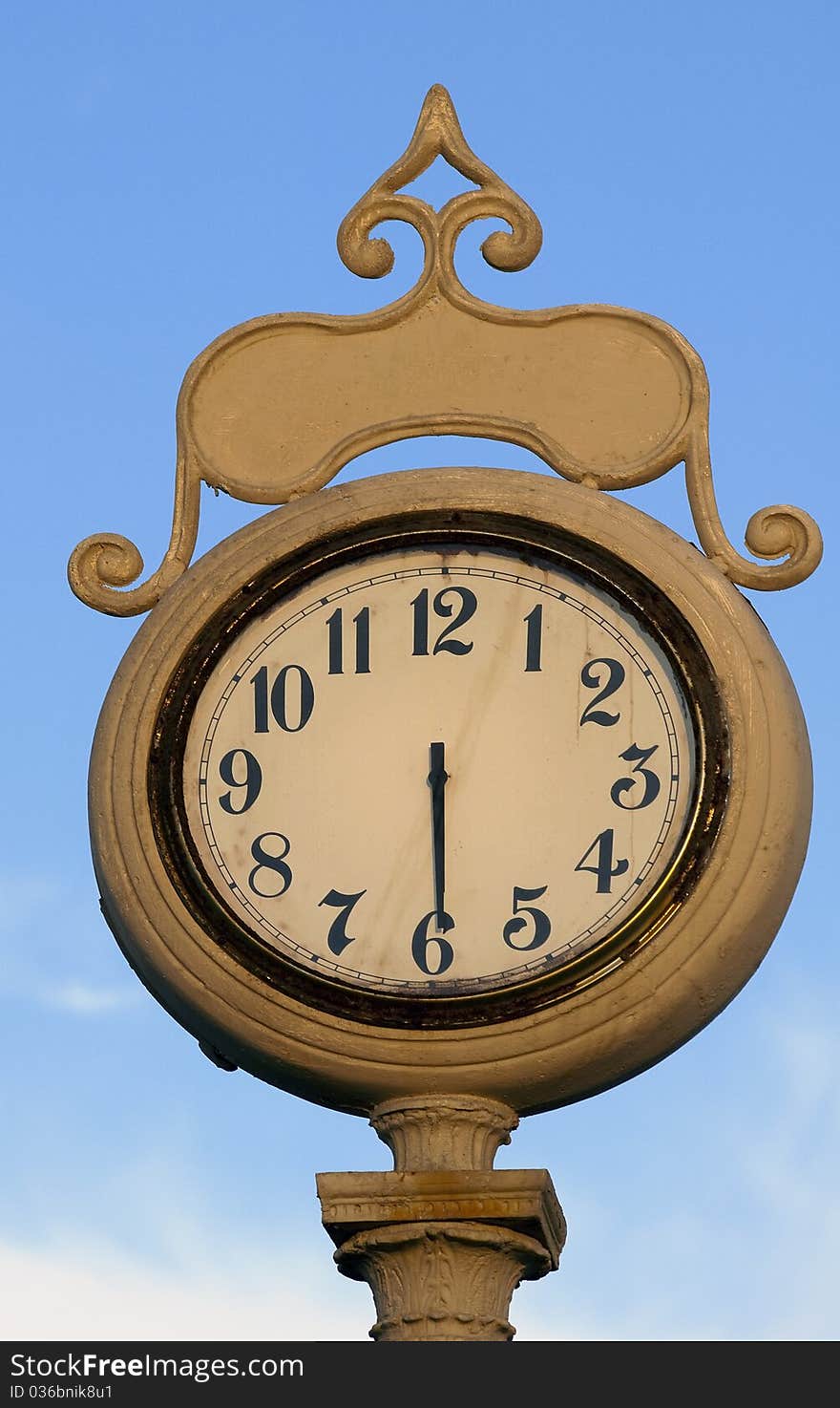 Close up image of old street clock.