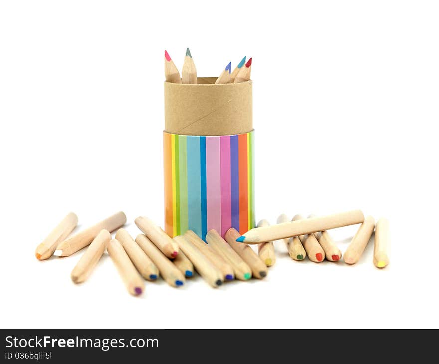 Colored pencils isolated against a white background