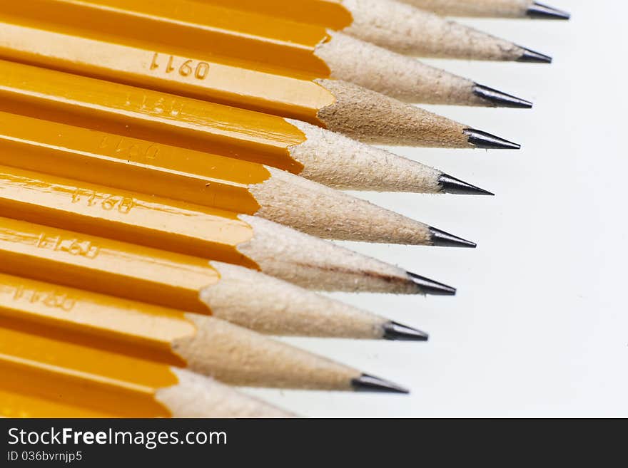 No 2 graphite pencils isolated on a white desk. No 2 graphite pencils isolated on a white desk