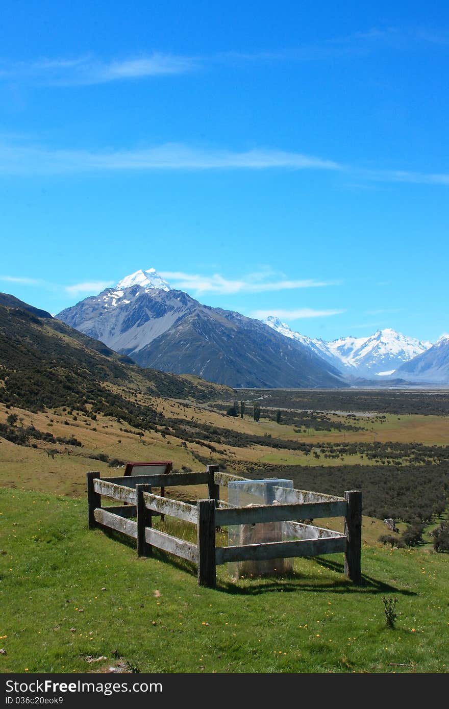 Looking over a single grave towards The icey summit of Mt Cook. Looking over a single grave towards The icey summit of Mt Cook.