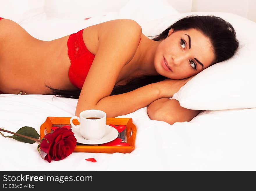 Girl Lying In Bed With Gifts, Cards, Hearts, Coff