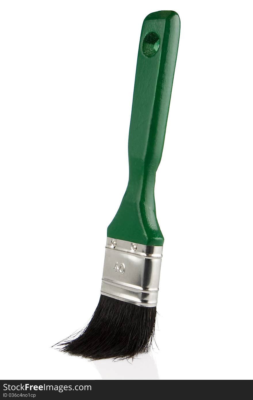 Green paintbrush isolated on white background