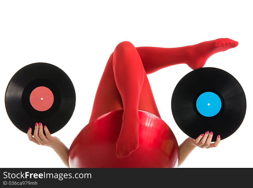 Female feet with vinyl record