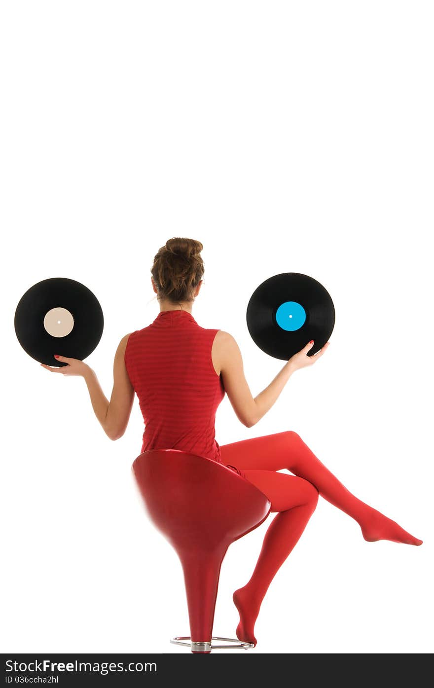 Young woman with vinyl record isolated in white