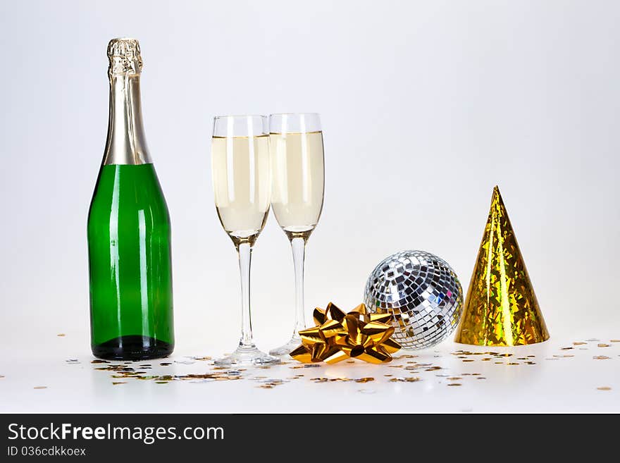 Champagne and glass on the white background. Champagne and glass on the white background.