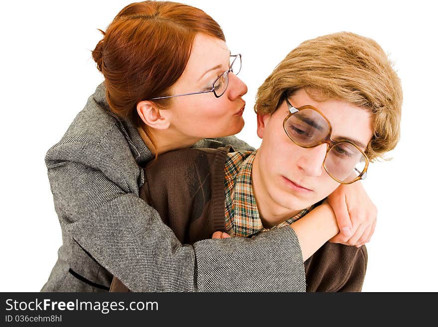 Woman trying to kiss a nerd