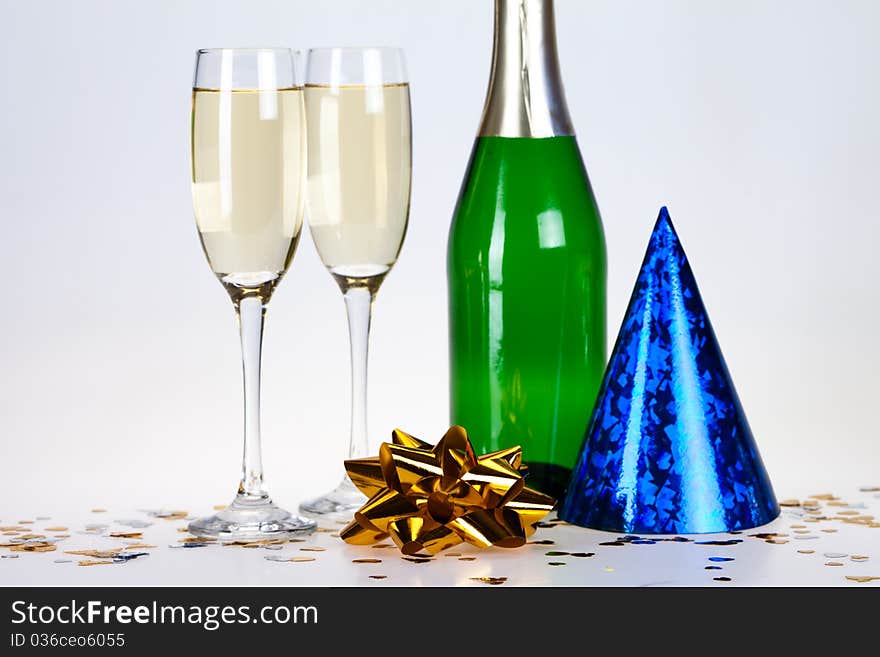 Champagne and glass on the white background. Champagne and glass on the white background.