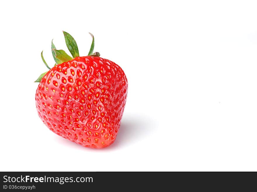 Single fresh red strawberry on white background. Single fresh red strawberry on white background