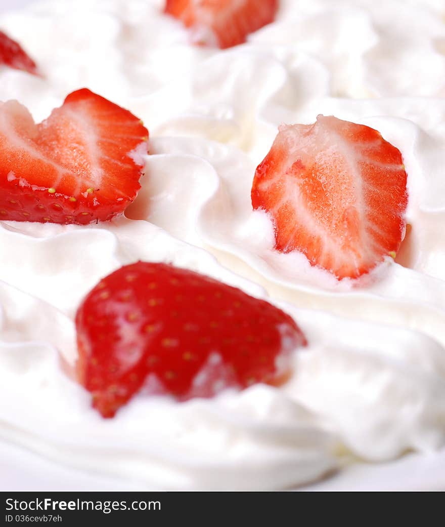 Fresh strawberries on cream close-up shot. Fresh strawberries on cream close-up shot