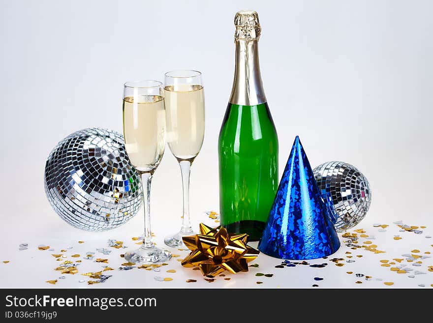 Champagne and glass on the white background. Champagne and glass on the white background.