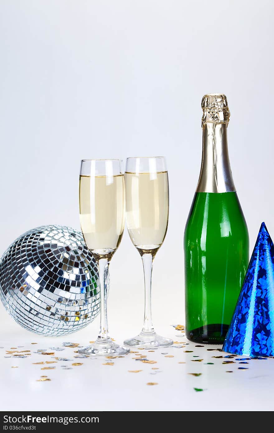 Champagne and glass on the white background. Champagne and glass on the white background.