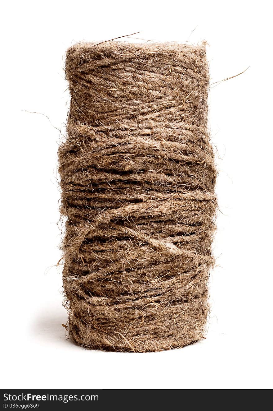 Big bobbin with thread, isolated on a white background