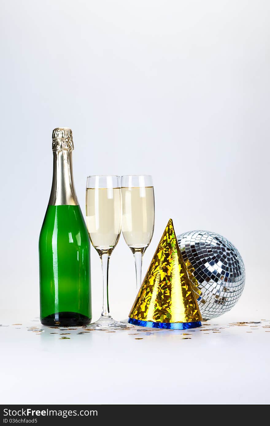 Champagne and glass on the white background. Champagne and glass on the white background.