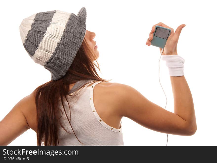 Girl listening to music in white headphones