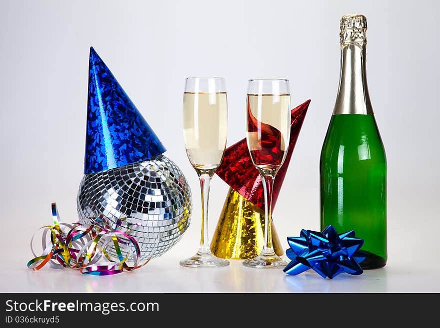 Champagne and glass on the white background. Champagne and glass on the white background.