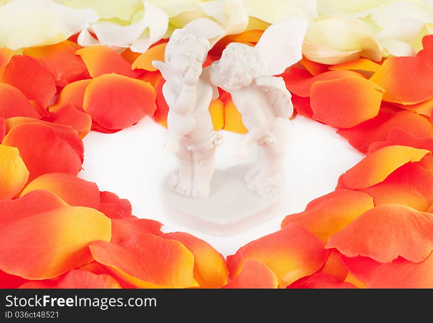 Rose Petal Heart with kissing couple. Rose Petal Heart with kissing couple