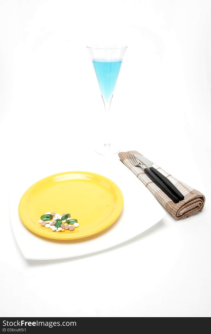 Place setting with plateand and pills. Place setting with plateand and pills