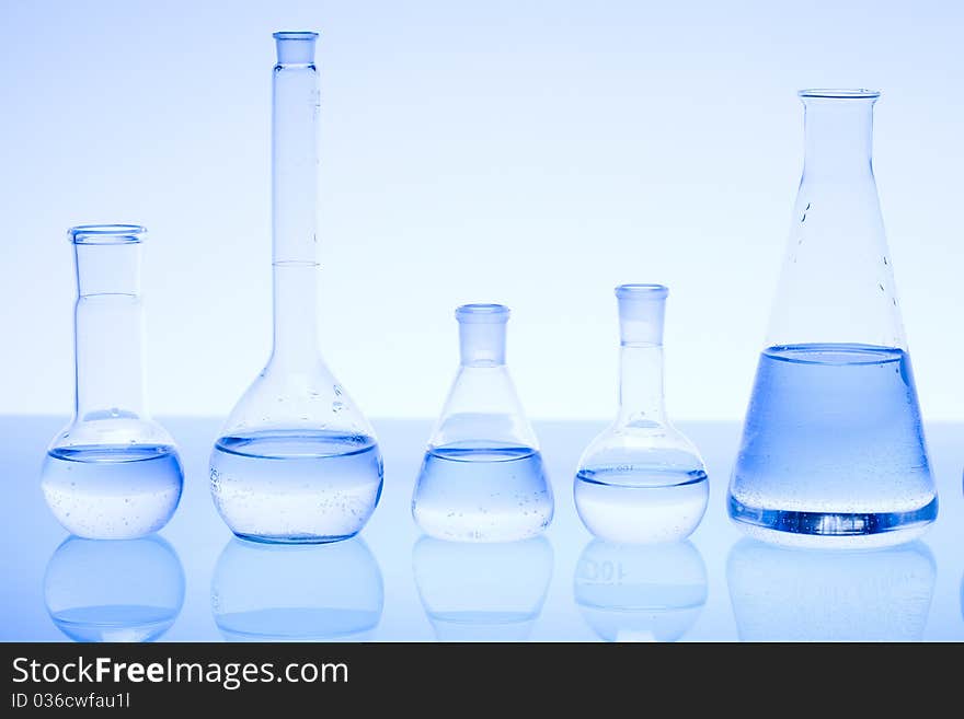 Laboratory glass over the background