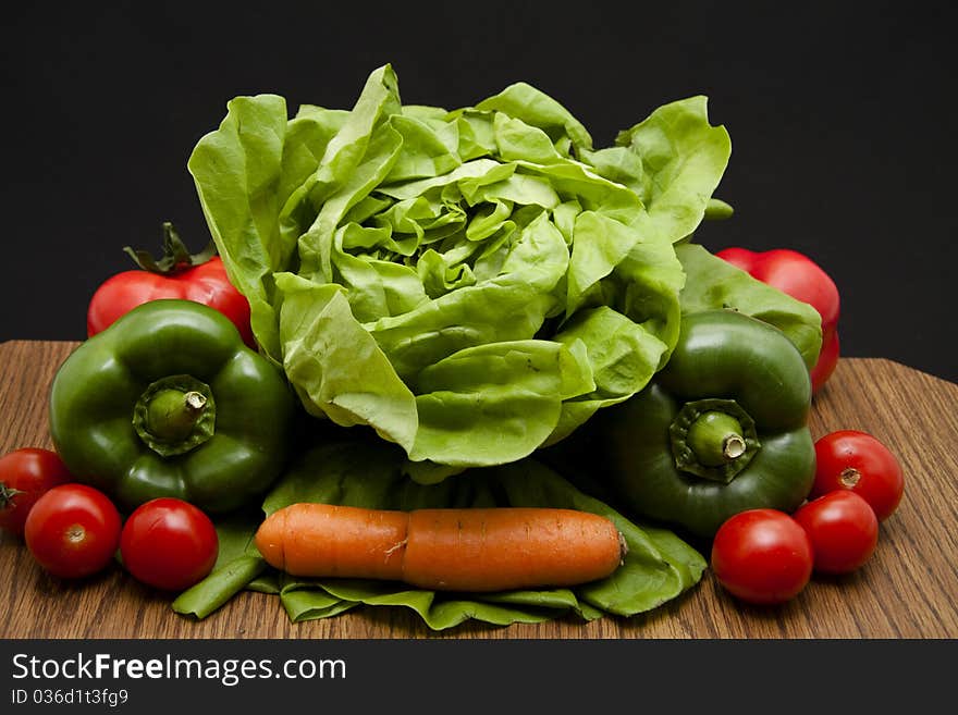 Head lettuce with paprikas and carrot. Head lettuce with paprikas and carrot