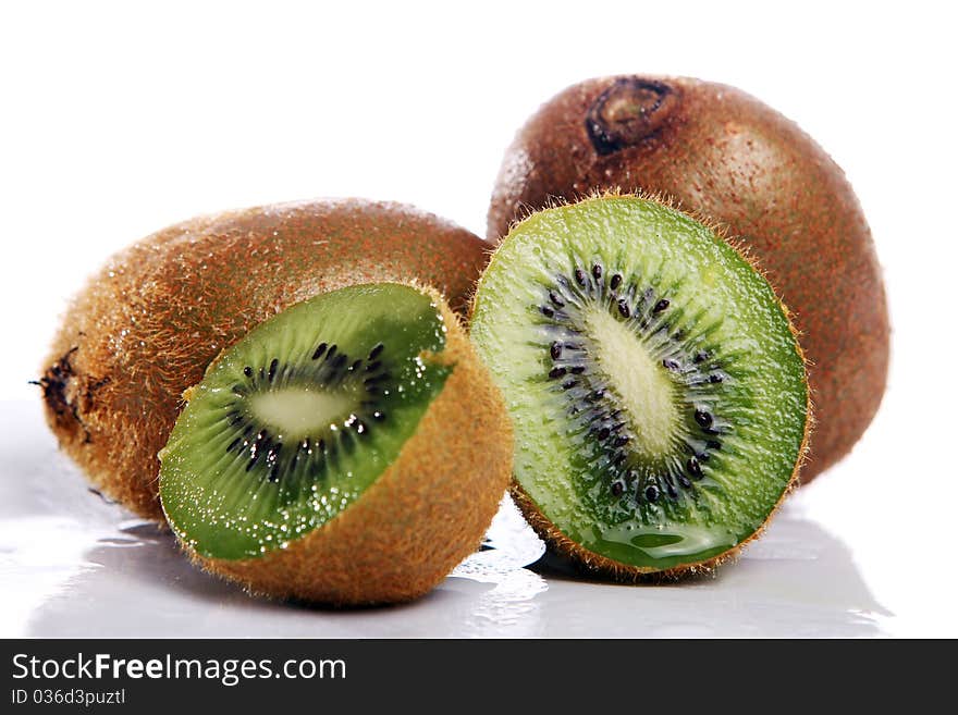 Fresh and wet kiwi on white background. Fresh and wet kiwi on white background