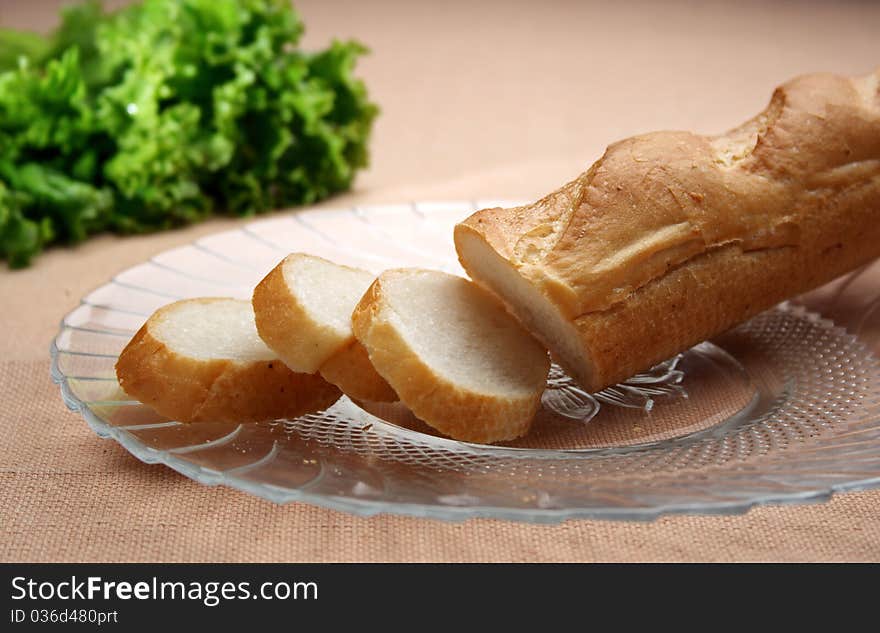 long loaf cut in pieces and the leaves. long loaf cut in pieces and the leaves