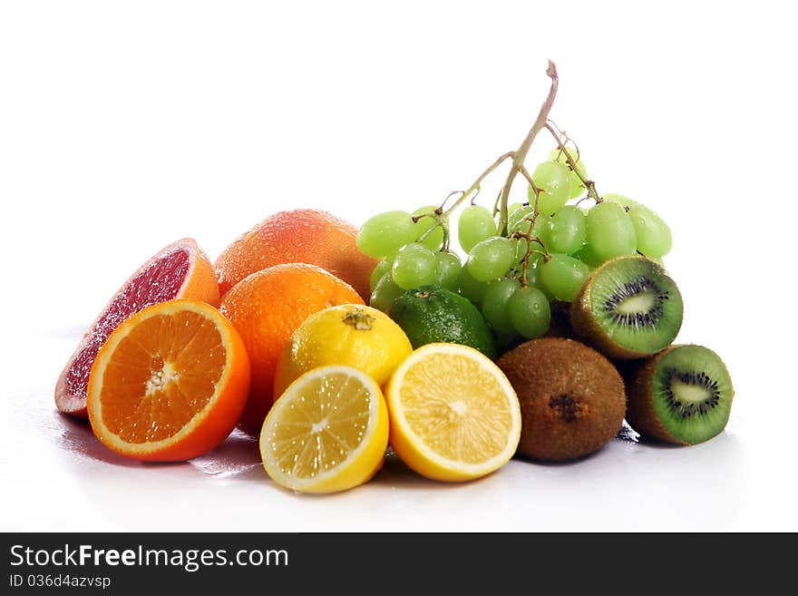 Fresh and wet fruits isolated on white background. Fresh and wet fruits isolated on white background