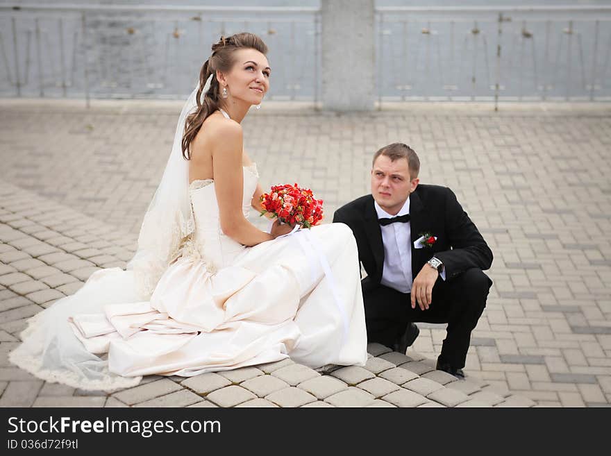 Beautiful couple on a walk after marriage