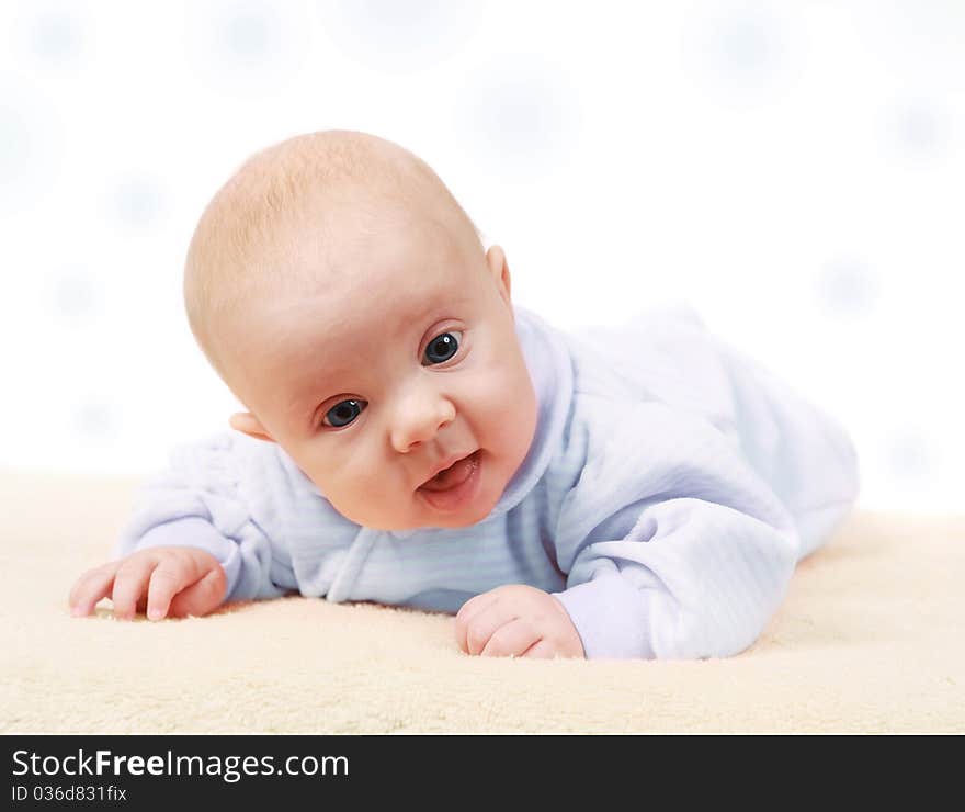 Beautiful little girl crawling on towel. Beautiful little girl crawling on towel