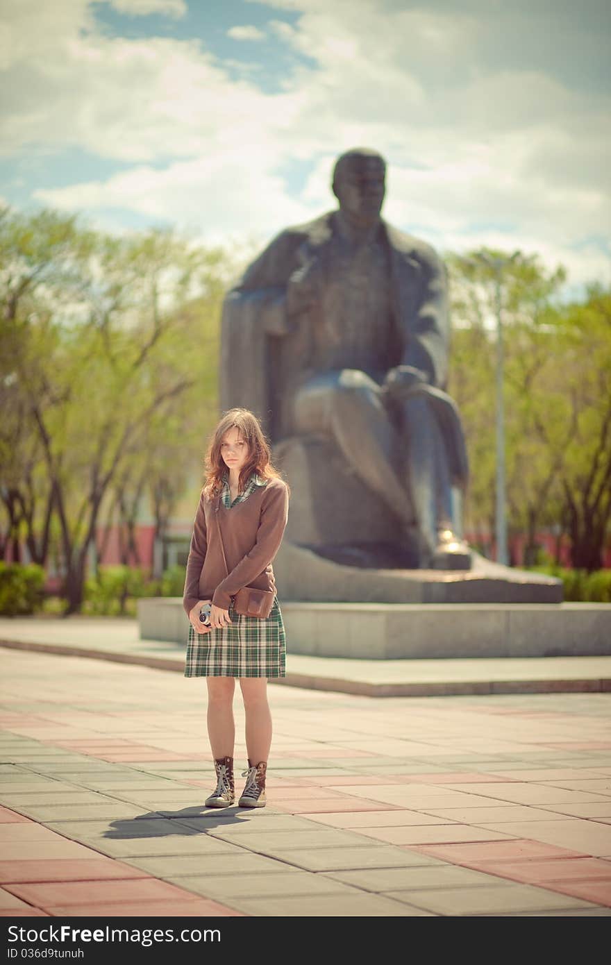 Devushka of squares, statues of fone, retro style. Devushka of squares, statues of fone, retro style